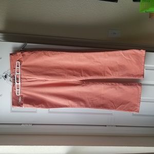 Coral corduroy jeans.